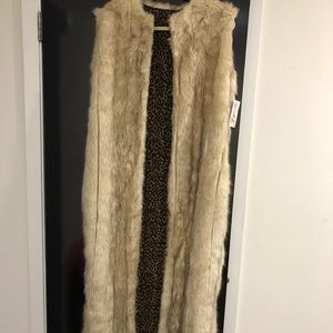 Faux fur long vest.